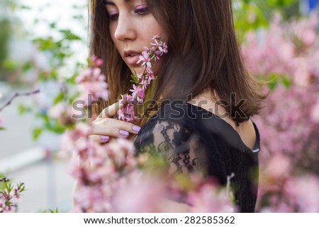 Similar – Woman posing in field of white flowers