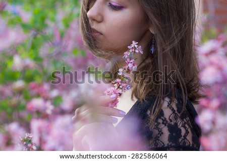 Similar – Woman posing in field of white flowers