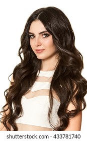 Portrait Of Young Beautiful Girl With Long Hair On The White Background.