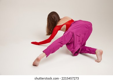 Portrait Of Young Beautiful Girl Wearing Shirt Instead Pants Isolated Over Grey Background. Self Expression . Concept Of Retro Fashion, Art Photography, Style, Queer, Beauty, Ad