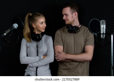 Portrait Of Young And Beautiful And Handsome Male Singers Working Together In Voice Recording Studio With Fun And Happiness, They Pose To Camera With Relax For Album Cover Photo.