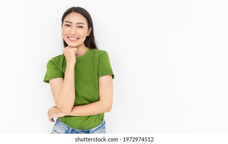Portrait of young beautiful happy model asian woman in green, facial treatment. Smile happy face fashion asian girl looking. Lifestyle japanese makeup smart people glow skin beauty, girl next door 