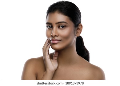 Portrait of young and beautiful Indian woman with a smooth skin on white background