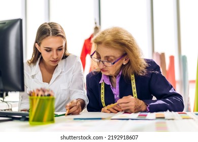 Portrait Of Young Beautiful Pretty Owner Business Woman Fashion Designer Stylish Sitting And Working.Attractive Senior Woman Designer Working With Colorful Fabrics At Fashion Design Workshop Studio