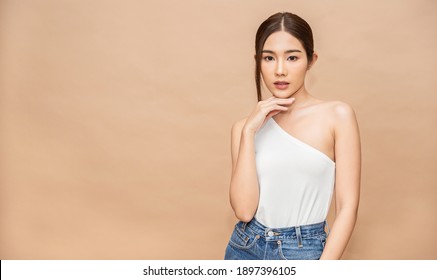 Portrait of young beautiful sexy asian korean woman slim fit body. Isolated of face fashion asian girl looking. Lifestyle japanese makeup, korea people glow skin, beauty girl next door.