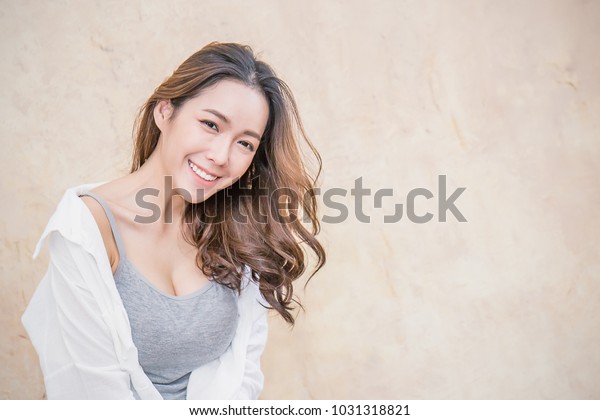 https://image.shutterstock.com/image-photo/portrait-young-beautiful-sexy-asian-600w-1031318821.jpg