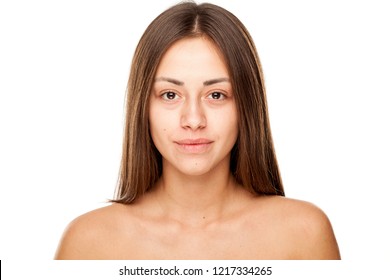 Portrait Of Young Beautiful Smiling Woman With No Makeup On White Backgeound