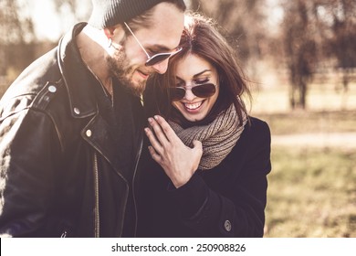 portrait of young beautiful stylish couple  in autumn park - Powered by Shutterstock