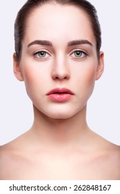 Portrait Of Young Beautiful Woman With Day Makeup And  Green Pistachio Colour Eyes