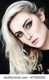 Portrait Of Young Beautiful Woman With Long Platinum Blond Hair And Stylish Winged Eyes Make-up