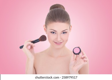 Portrait Of Young Beautiful Woman With Make Up Brush And Rouge Or Powder Over Pink Background