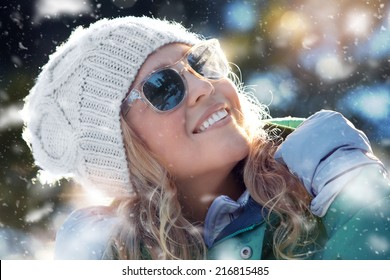 Portrait Of Young Beautiful Woman On Winter Outdoor Background 