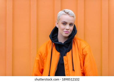 Portrait of young beautiful woman with short hairs - Influencer posing for a fashion advertising campaign - Powered by Shutterstock