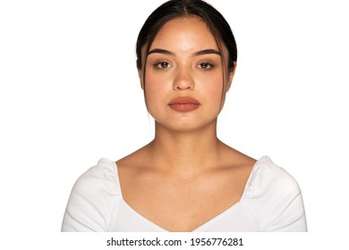 portrait of a young beautiful woman with tight black hair on a white background