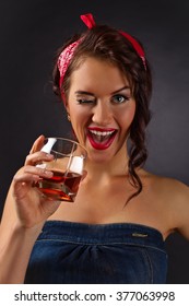 Portrait Of Young Beautiful Woman With Whiskey 