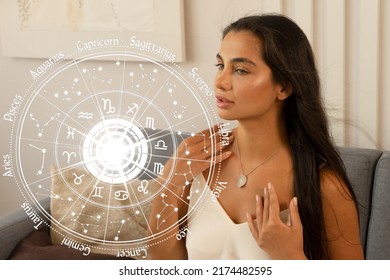 Portrait of young beautifull brunette woman with horoscope chart and astrology zodiac signs, relaxed female in morning before starting her new day. Future love predictions and numerology - Shutterstock ID 2174482595