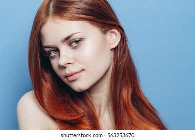 Portrait Of Young Beauty Woman With Clean Shiny Well-groomed Skin, Good Skin, Red Hair