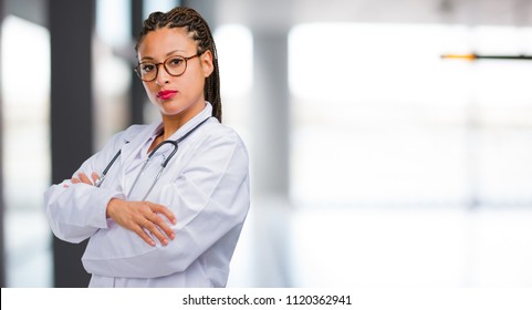 Portrait Of A Young Black Doctor Woman Very Angry And Upset, Very Tense, Screaming Furious, Negative And Crazy