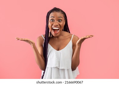 Portrait of young black woman feeling excited, shouting OMG or WOW, expressing emotion of joy on pink studio background. Unbelievable offer, shocking news, huge sale or discount