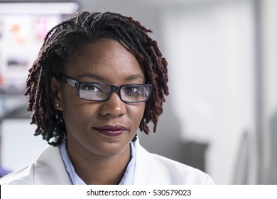 Portrait Of A Young Black Woman In A Lab Coat