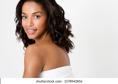 Portrait Of A Young Black Woman With Long Curly Hair