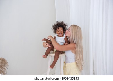 Black white woman having baby a Mum is