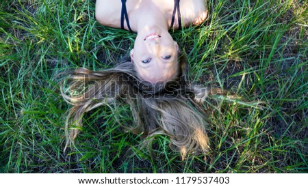 Similar – woman among daisies