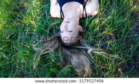 Similar – woman among daisies