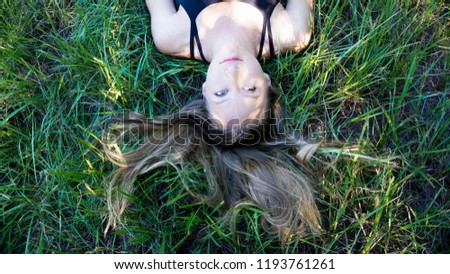 Similar – woman among daisies