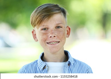 Portrait of young boy in the park