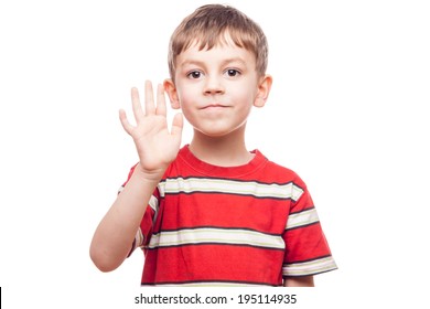 Portrait Of A Young Boy Waving On White Background