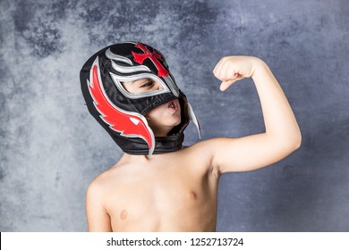 Portrait Of A Young Boy With A Wrestler Mask