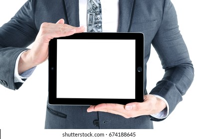 Portrait Of Young Business Man Wear Grey Suit Holding Digital Tablet In Hand With White Screen For Your Design Isolated On White Background