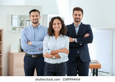 Portrait Of Young Business People In Office