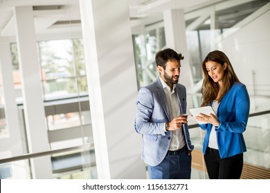 Portrait Of Young Business People Standing In The Office