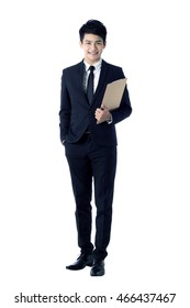 Portrait of young businessman with a clipboard - Shutterstock ID 466437467