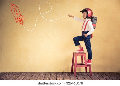 Portrait of young businessman with jetpack in office. Success, creative and innovation technology concept. Copy space for your text - Powered by Shutterstock