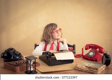 Portrait Of Young Businessman Kid In Office. Success And Creative In Business Concept