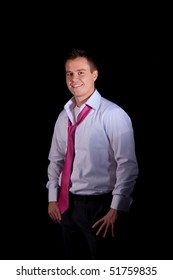 Portrait Of Young Businessman In Shirt And Loose Tie