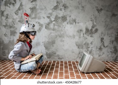 Portrait Of Young Child Pretend To Be Businessman. Nerd Kid With Toy Virtual Reality Headset. Child Geek Playing At Home. Kid Having Fun Indoors. Success, Creative And Innovation Technology Concept