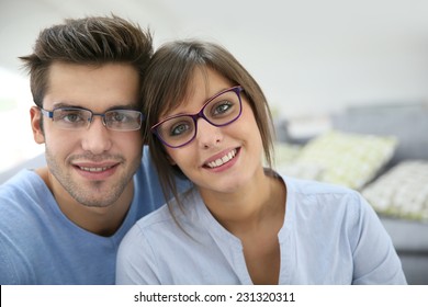 Portrait Of Young Couple With Eyeglasses On