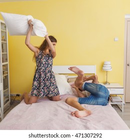 Portrait Of Young Couple Teens , Pillow Fight 