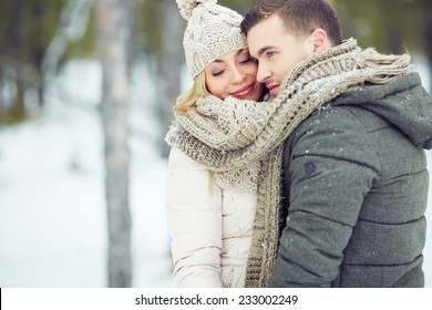 Portrait of a young couple in warm clothing