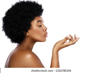 Portrait of young and cute african woman on white background