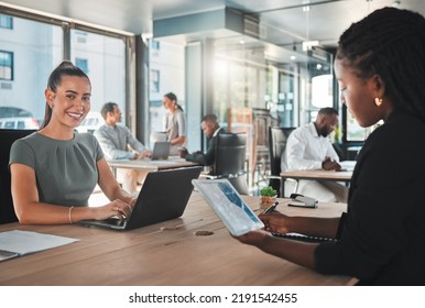 Portrait Of A Young Digital Marketing Agency Employee Writing A Proposal Or A Growth Strategy For The Company. Happy, Excited And Smiling Business Woman Working In A Busy Office Typing On A Laptop