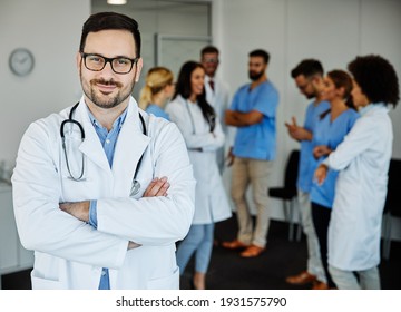 Portrait Of A Young Doctor Or Physician In The Front Of His Team