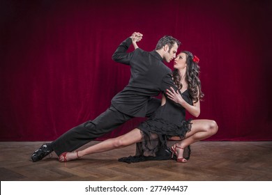 Portrait Of Young Elegant Tango Dancers.