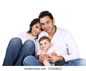 Portrait Of Young Family Isolated On White Background, Cheerful Parents With Cute Baby Posing In The Studio, Togetherness Concept