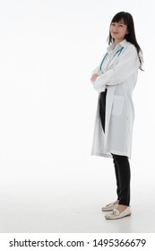 Portrait Of Young Female Doctor In Coat Full Body Isolated White Background Copy Space.