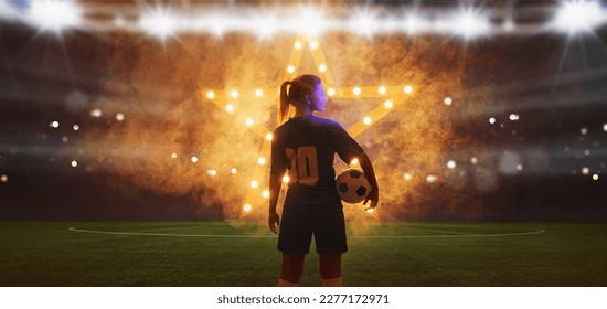  Portrait of young female soccer player with soccer ball standing with a shining star in the back - Powered by Shutterstock